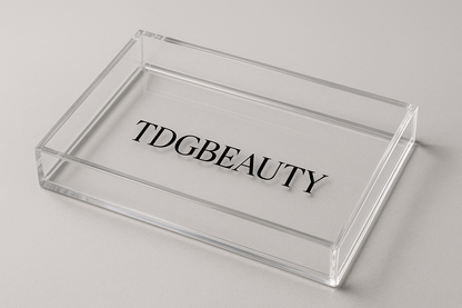 fais un petit plateau en plexi glass avec mon logo TDGBEAUTY dessus s'il te plait